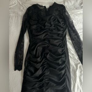 Women’s black dress with lace detailing